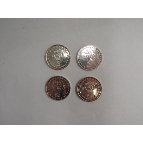 4338 - Four silver coins depicting Laxmi and Ganesh, marked Jalan 999 fine silver, 20 grams    (R) £30