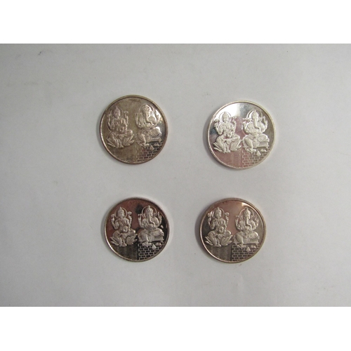 4338 - Four silver coins depicting Laxmi and Ganesh, marked Jalan 999 fine silver, 20 grams    (R) £30