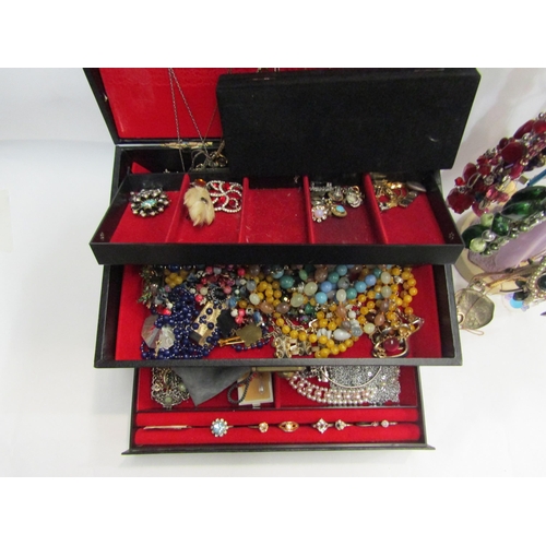 4356 - A large quantity of bijouterie on stand, cased and in jewellery box, necklaces, rings, brooches