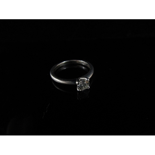 6236 - A platinum set diamond solitaire ring 0.38ct approx, in four claw setting. Size J/K , 3.8g, with cop... 