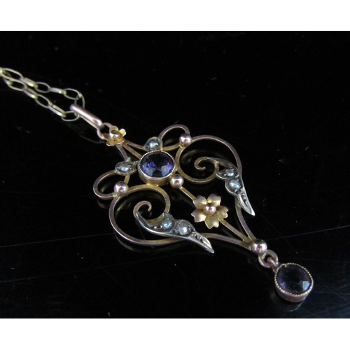 6016 - A 9ct gold chain, 50cm long, hung with an Edwardian seed pearl and amethyst drop pendant, unmarked, ... 