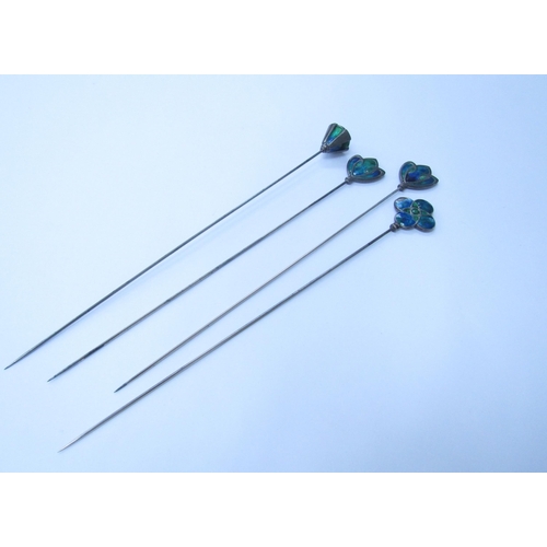 6053 - Four Art Nouveau enamelled hatpins in blues and green, unmarked