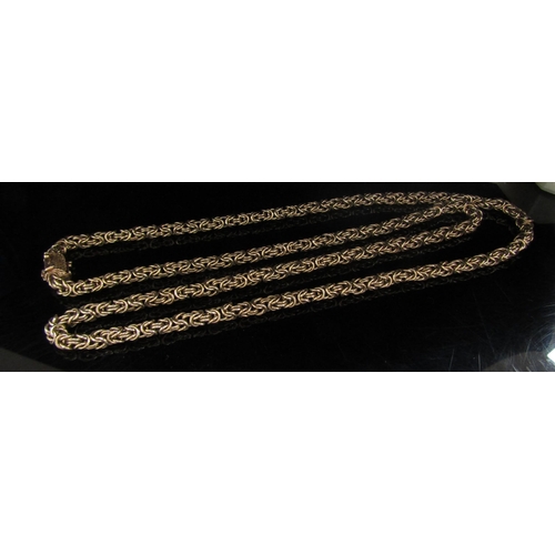 6134 - A 9ct gold fancy link neckchain with double safety clasp, 76cm long, 41.6g