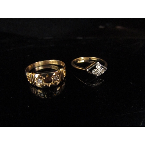 6186 - Two 18ct gold rings one with two diamonds, centre stone missing. Size Q, the other with four diamond... 