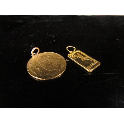 6203 - A 1910 gold 10 Korona coin on pendant loop and a 1g fine gold 999 