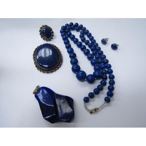 6208 - A Lapis Lazuli bead necklace, brooch, large pendant, ring and earrings