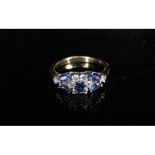 6220 - A gold sapphire and clear stone ring, unmarked. Size K/L, 2.9g       (R) £80