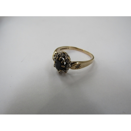 6224 - A 9ct gold sapphire and diamond chip cluster ring. Size N, 2g