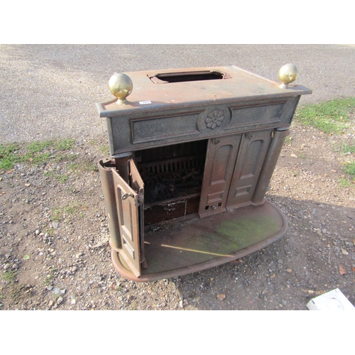 3288 - A cast wood burner on decorative feet      (E) £30-50