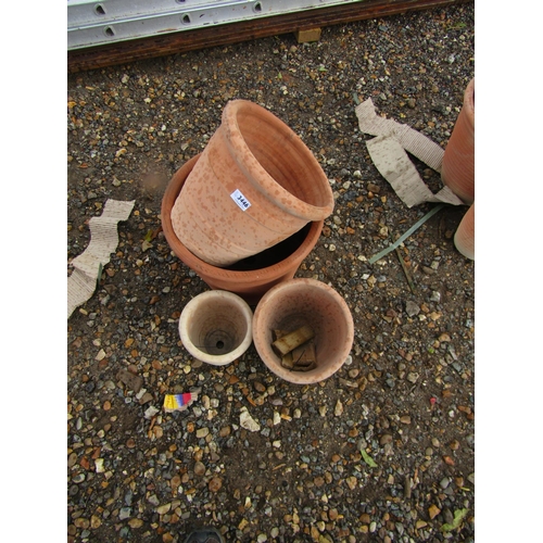 3446 - A set of four graduating terracotta pots           (E) £30-45