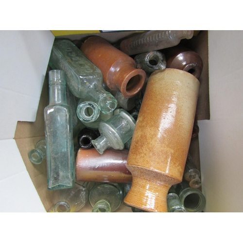 8268 - A box of mixed glass bottles and four stoneware ink bottles