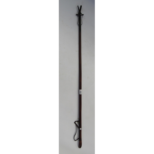 8281 - A 19th Century iron and bamboo lever action candle wick trimmer, marked London, 115cm