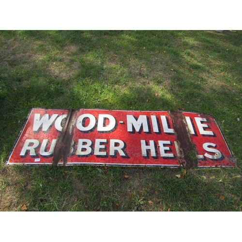 8365 - An enamel sign; Wood-Milne Rubber Heels, 72