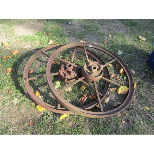 8428 - A pair of iron implement wheels, 32