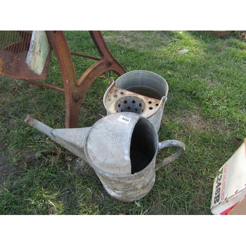 8436 - A galvanised watering can and mop bucket