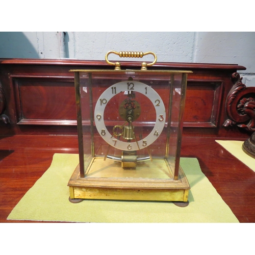 A 1960's Kundo Obergfell mantel clock, brass cased