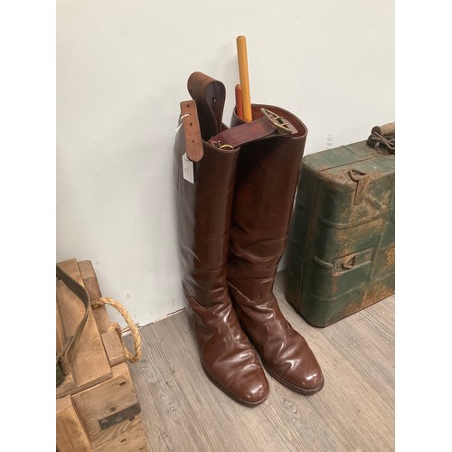 5014 - A pair of brown leather military boots together with a half-height pair of black leather boots, Sam ... 