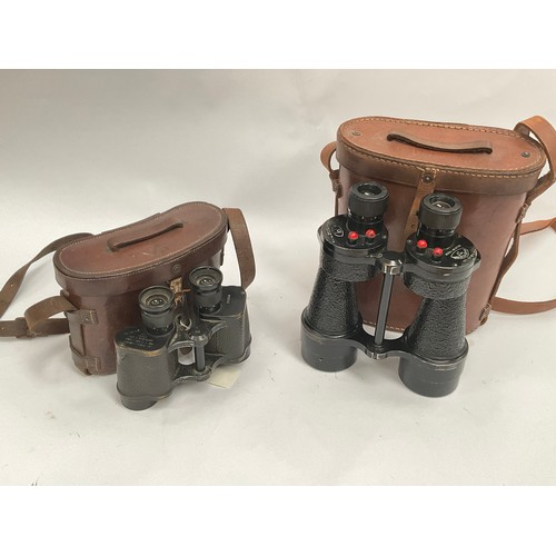 5058 - A pair of WWII British Army binoculars with brown leather case, together with another pair of Kersha... 