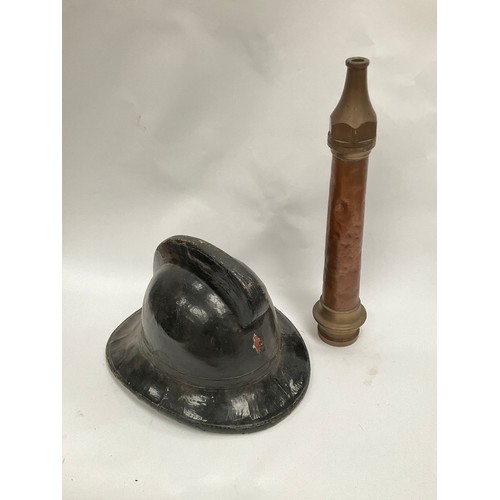 5063 - A vintage fireman's helmet together with a fireman's brass hose nozzle (2)