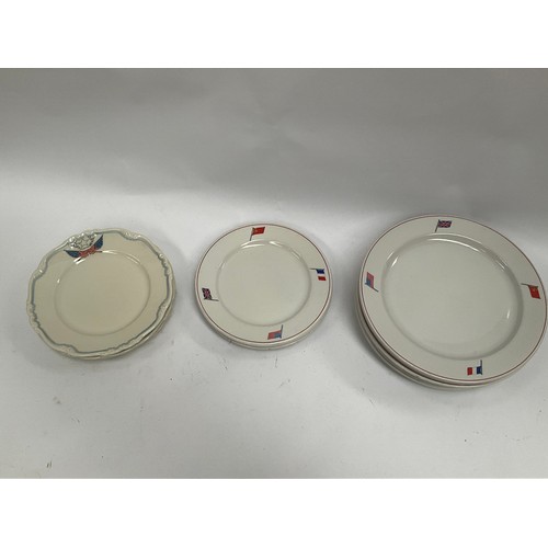 5067 - A set of six 1940's dinner plates and three matching side plates bearing flags of USA, France, USSR ... 