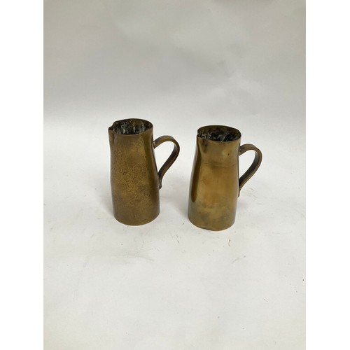 5078 - A pair of trench art brass shell case jugs