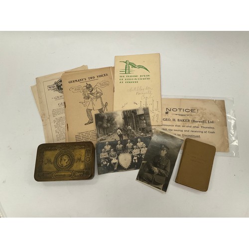 5093 - A WWI 1914 Princess Mary gift tin with various documents, booklets and a 1918 soldier's bible