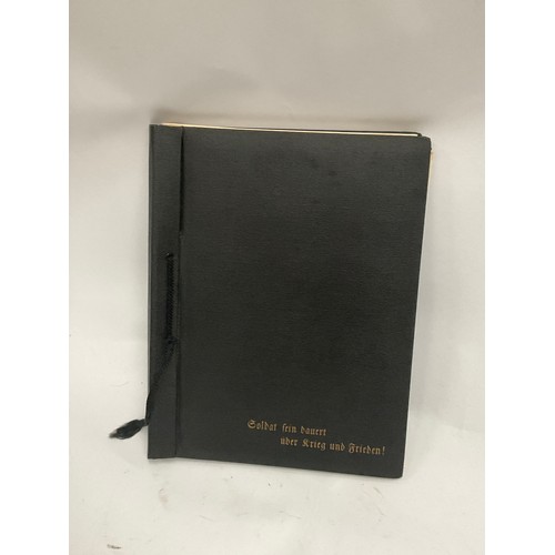 5097 - A WWII German soldier's service record book (Ehrenbuch) with various photographs of Hitler, Hess and... 