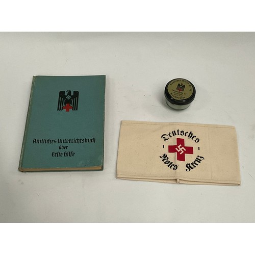 5103 - A German 1942 Red Cross book together with German Red Cross ointment and a replica armband    (C)