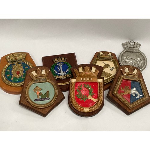 5111 - A box of ship’s crests: HMS Hero, Yarmouth, Antrim, Birmingham, Auriga, Dundas and RNA Bury St. Edmu... 