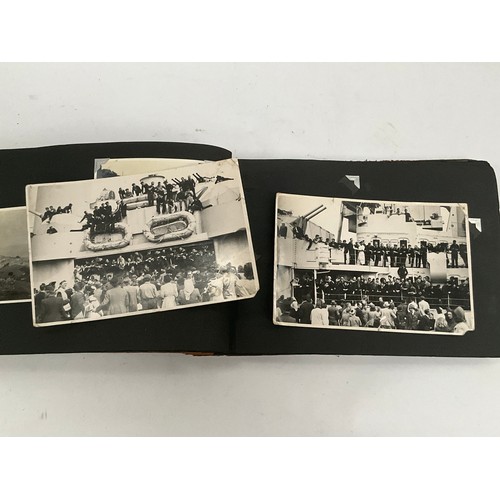 5115 - An album of WWII and later photographs including Naval, battleships firing and passing cities, seapl... 