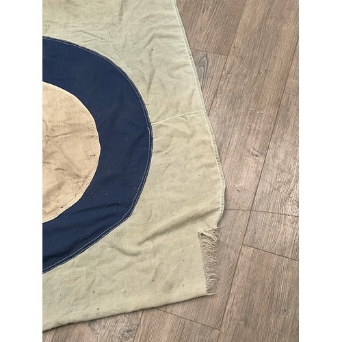 5238 - A WWII British RAF airbase flag, marks to lanyard indistinct, some damage, blue ground with target a... 