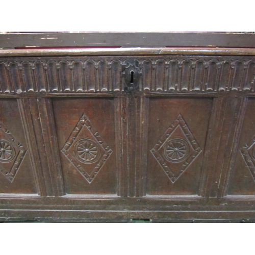 4015 - A late 18th Century four panel carved oak coffer, 63cm high x 130cm wide x 57cm deep    (R) £140