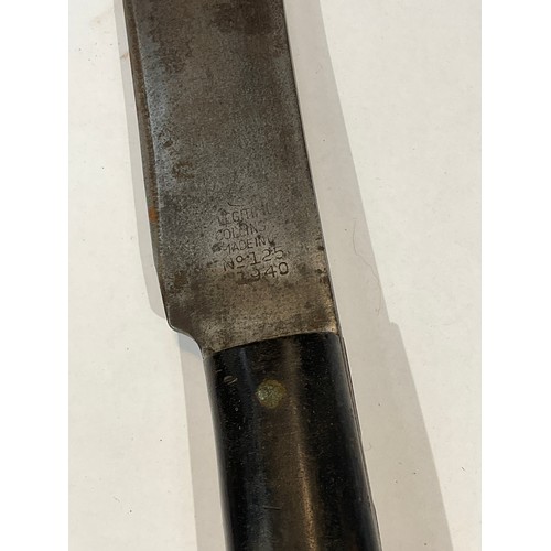 5283 - A WWII US machete, marked 1940, with sheath