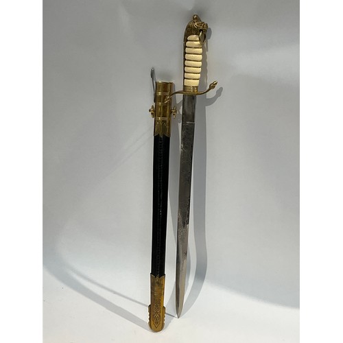 5299 - A replica of a British Naval Officer’s dirk, with scabbard.