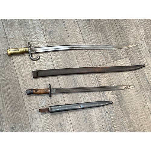 5300 - A 19th Century French Model 1866 Chassepot sabre bayonet, dated 1871 to blade back, with scabbard. A... 