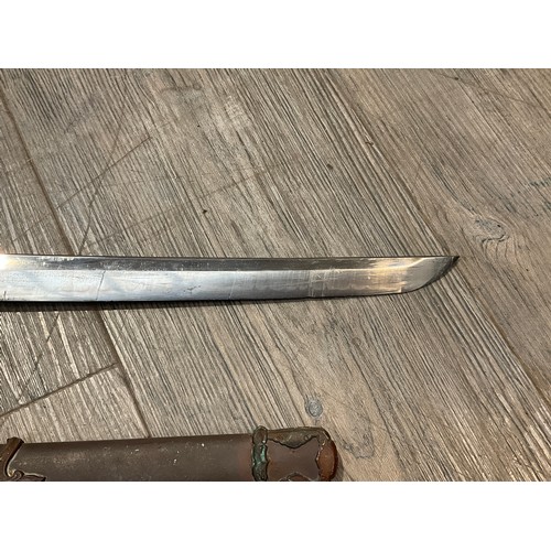 5308 - A WWII Japanese Type 98 Japanese Officer's Shin-Gunto sword, polished single-edged blade of typical ... 