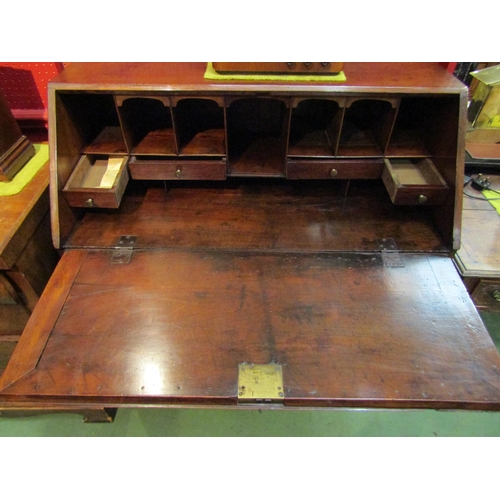 4085 - A George III circa 1800 cherrywood writing bureau the fitted interior over four graduating long draw... 