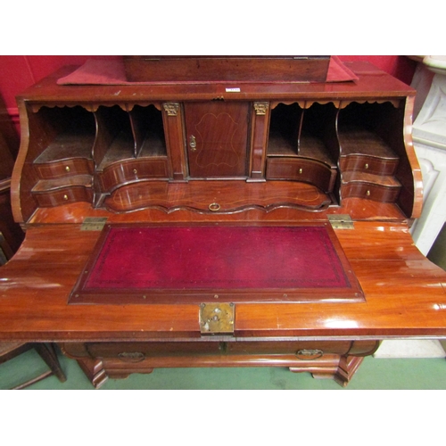 4115 - A Circa 1850's Dutch walnut bombe bureau the serpentine shape fall having a well fitted interior and... 