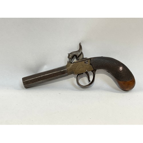 5320 - A 19th Century percussion pistol, faceted barrel, brass engraved box lock, crosshatch carved walnut ... 