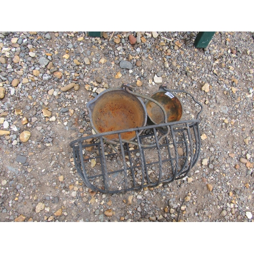 3308 - A metal basket holder and two cast pots