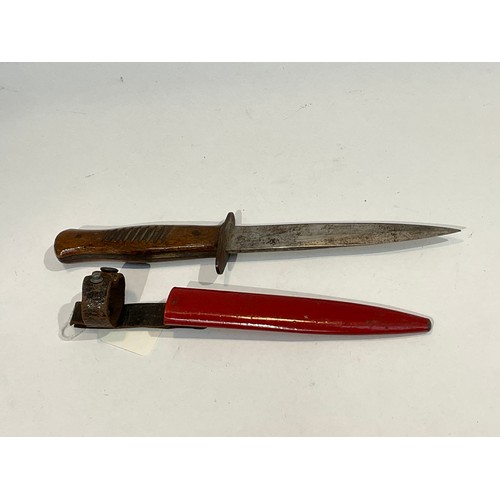 5345 - A WWI era German combat / trench knife, the blade by Hugo Koller, Solingen, with red painted steel s... 