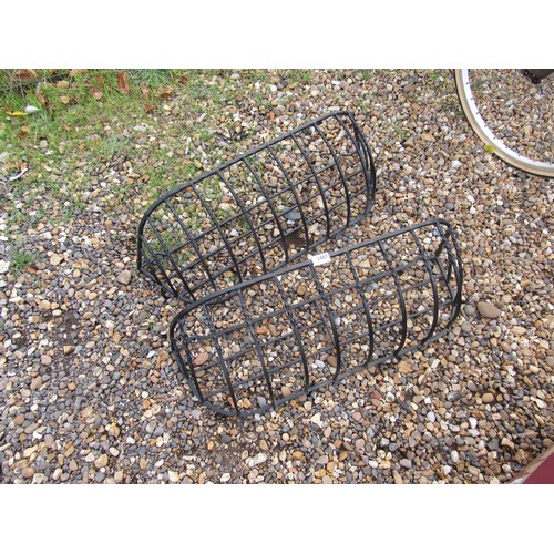 3487 - A pair of metal trough basket holders