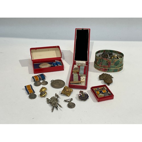 5361 - A quantity of medals and insignia including miniature medals, buttons and King George VI Coronation ... 