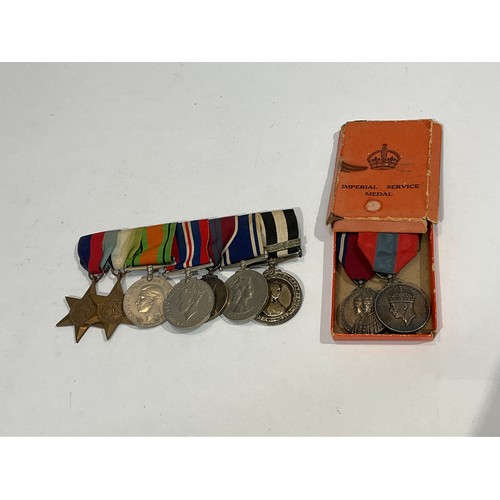 5377 - A WWII and later medal group of seven consisting of 1939-45 and Atlantic stars, Defence Medal, War M... 