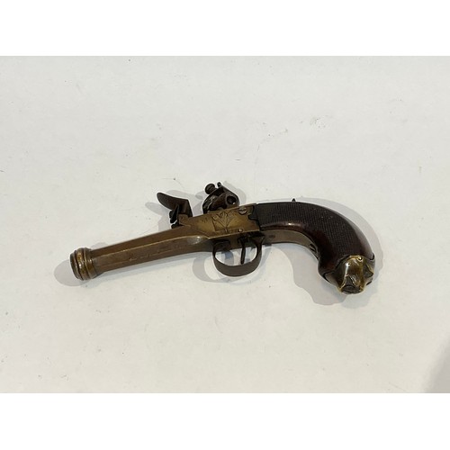 5390 - A late 18th / early 19th Century brass framed Continental flintlock boxlock pocket pistol