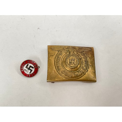 5402 - A German Waffen-SS style brass belt buckle, RZM markings to reverse, soldered mount. An Adolf Hitler... 