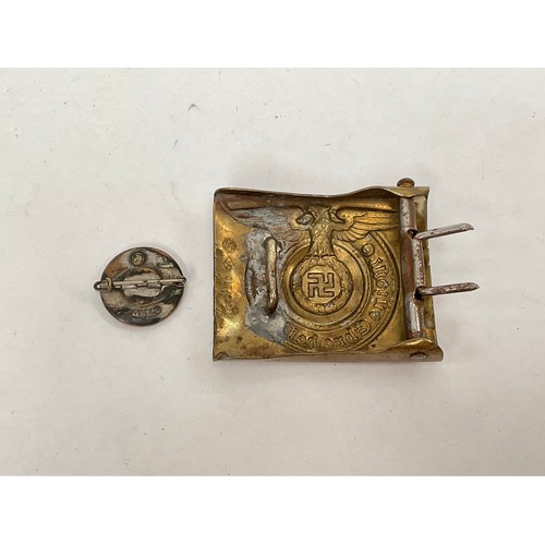 5402 - A German Waffen-SS style brass belt buckle, RZM markings to reverse, soldered mount. An Adolf Hitler... 