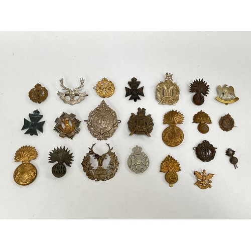 5405 - A collection of British military cap badges including Scottish, Fusilier and Royal Flying Corps (RFC... 