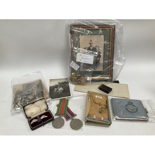 5422 - A box of mixed militaria including a pair of WWII medals, badges and ephemera