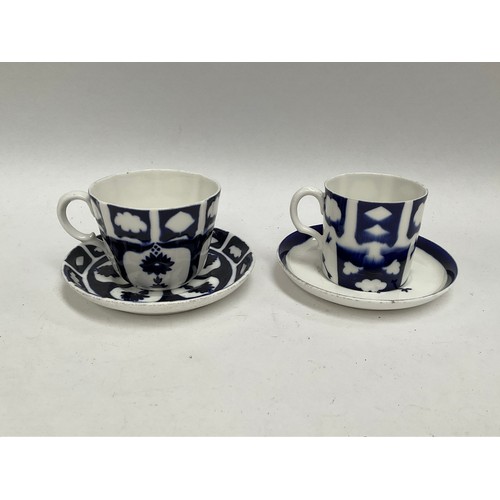 5450 - Two WWII German Kriegsmarine U-Boat blue and white porcelain cups and saucers, one set marked with e... 